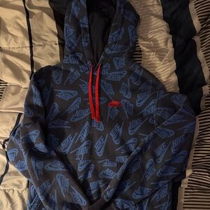 Nike Hoodie with Blue Logo and Red Accents